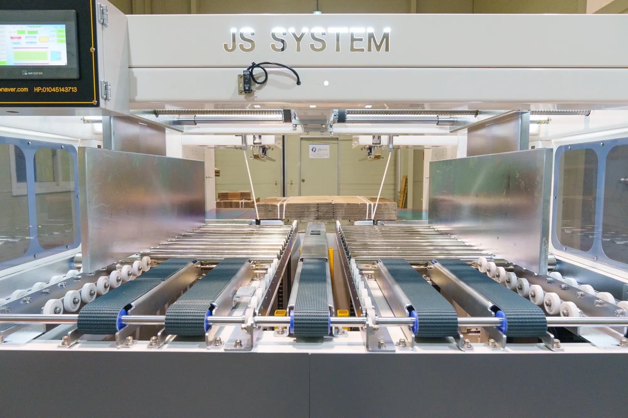 JS SYSTEM Automatic Inline Strapping Machine