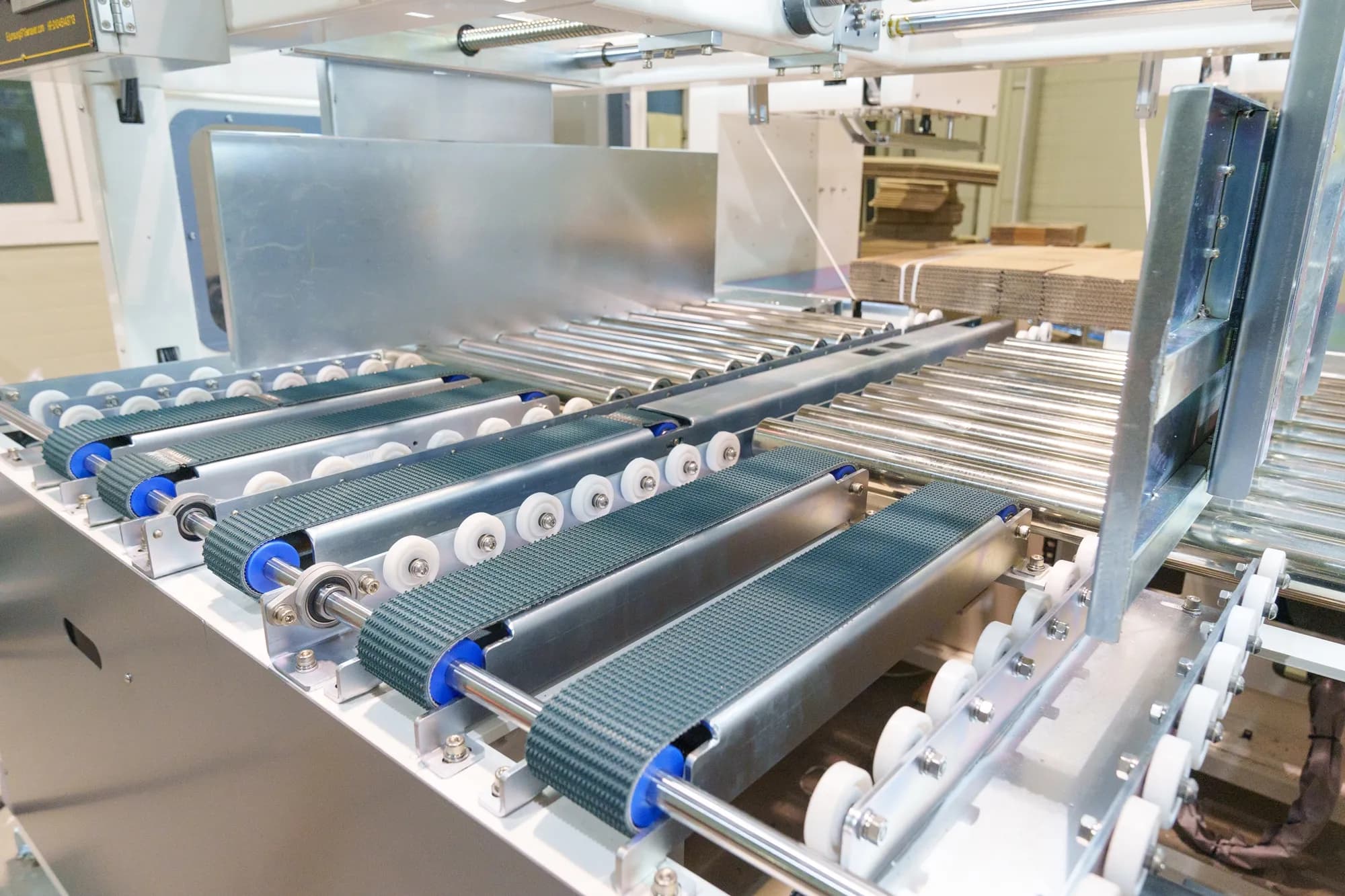 AMB 1500 S/T Automatic Inline Strapping Machine front view